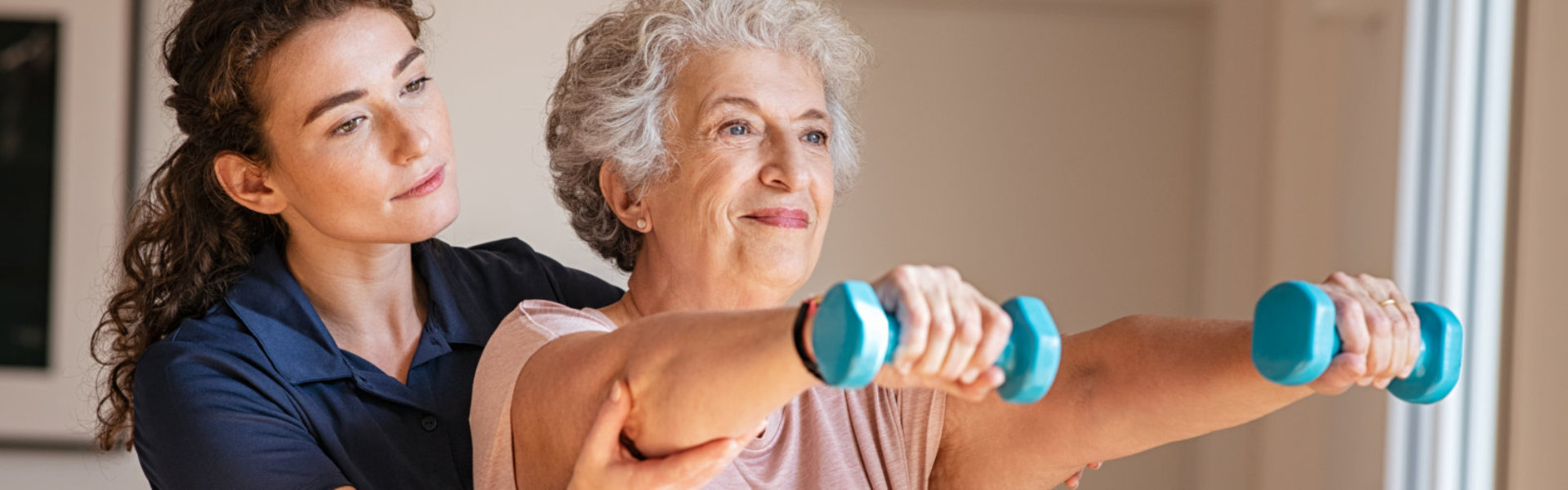 woman helping elderly woman