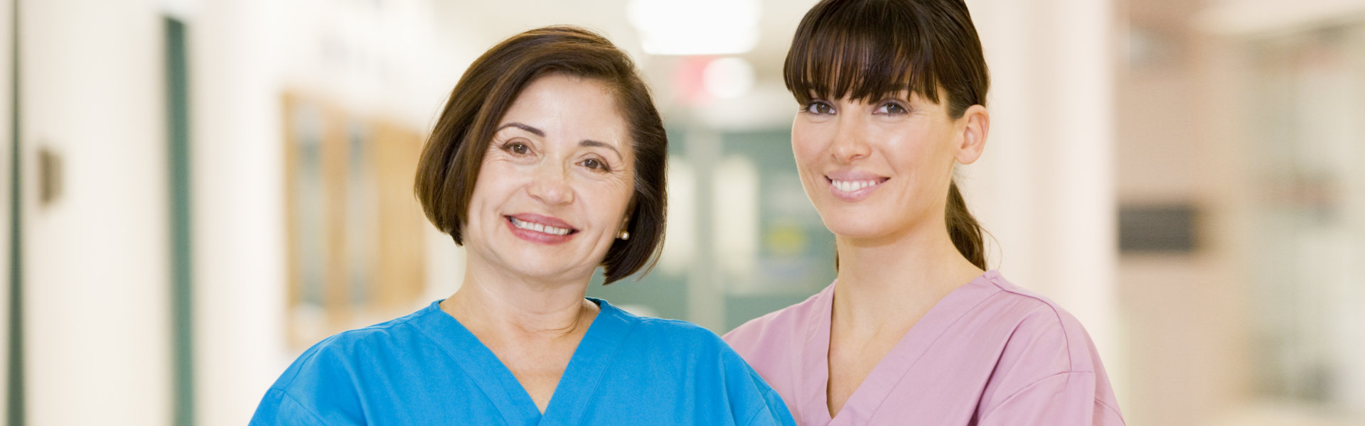 two woman smiling